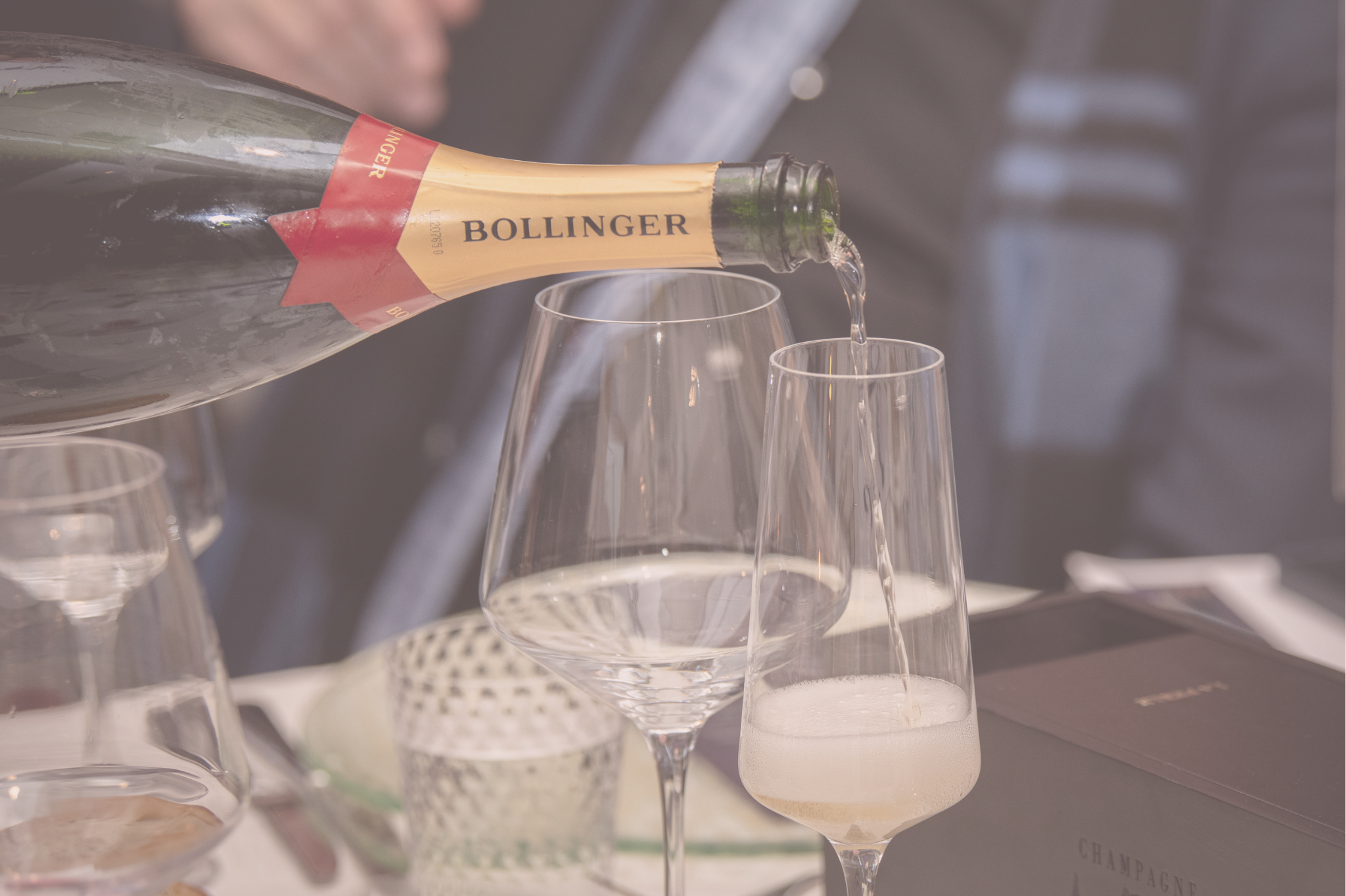 Bottle of Bollinger champagne being poured